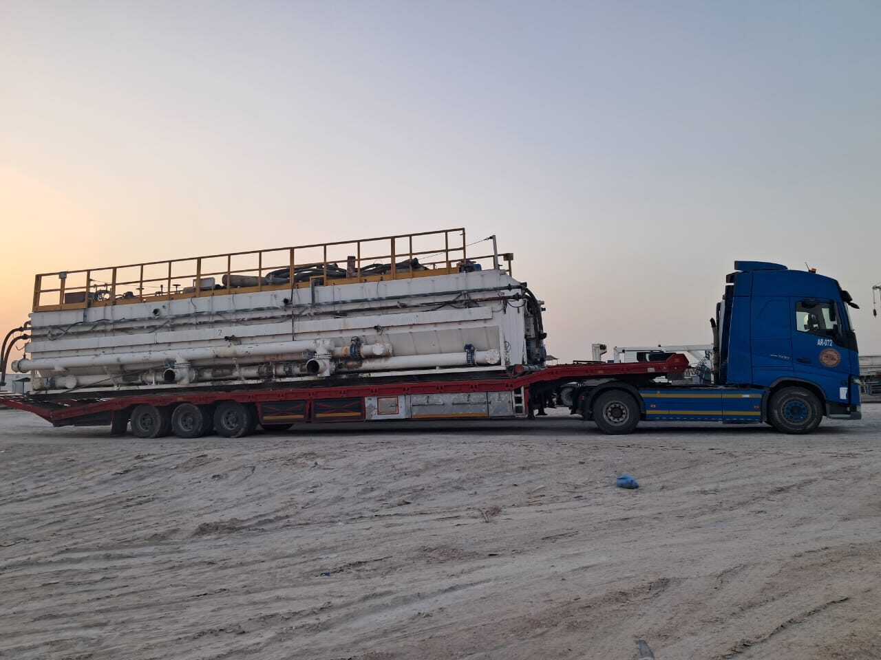 Oilfield tank at sunset on ARTC trailer