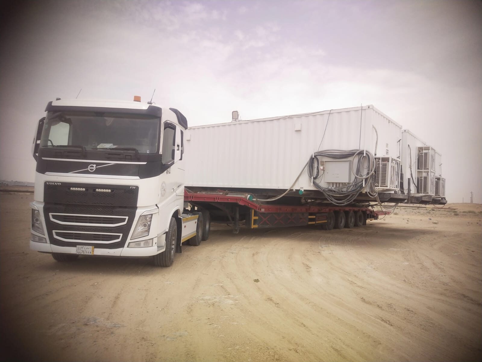 ARTC Flatbed trailer with container cargo